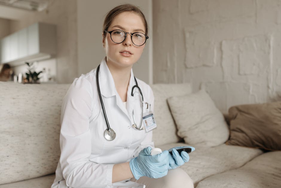 Female doctor with glucometer on a sofa, assessing blood sugar control indoors